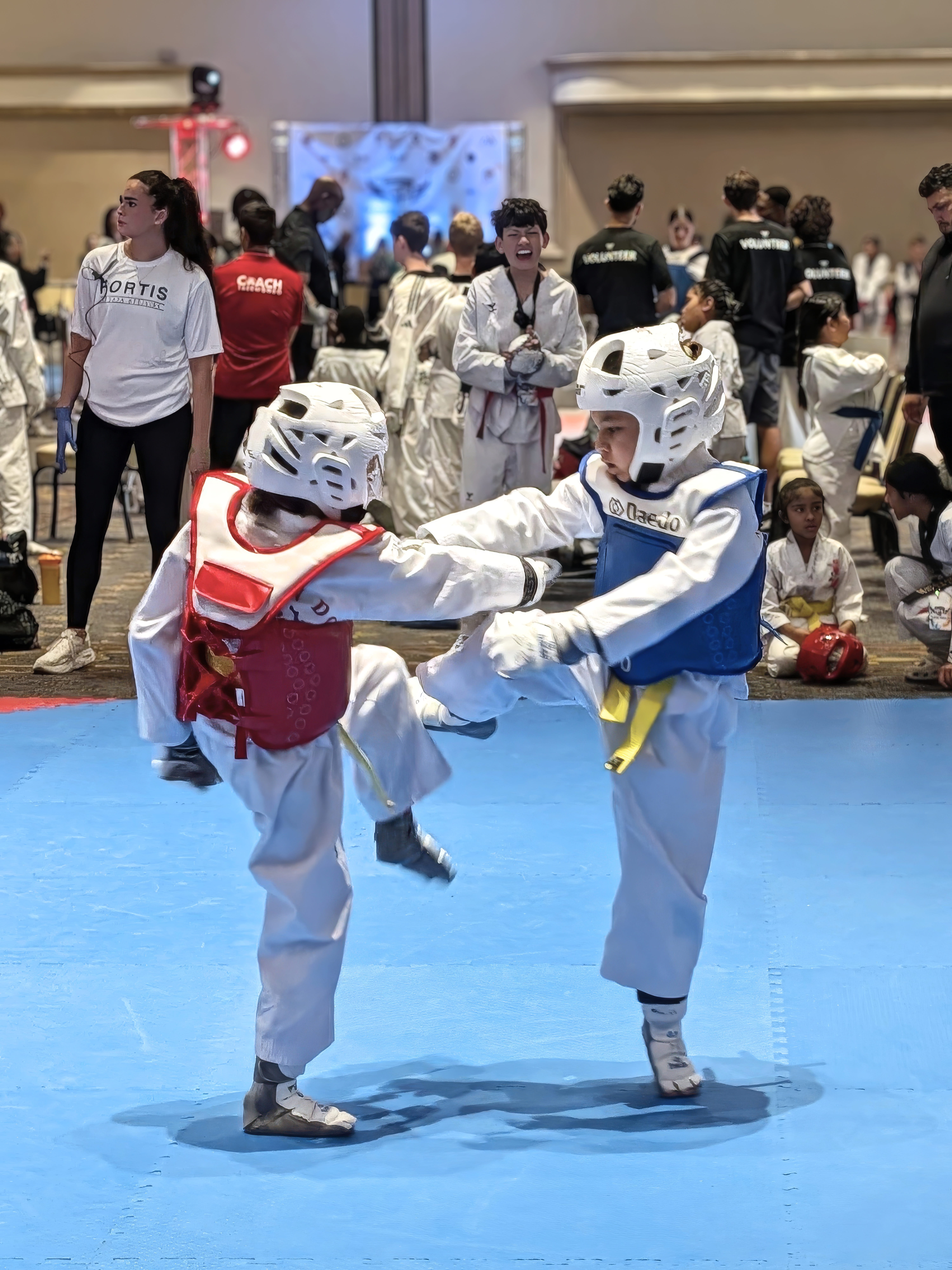Young athletes sparring at competition